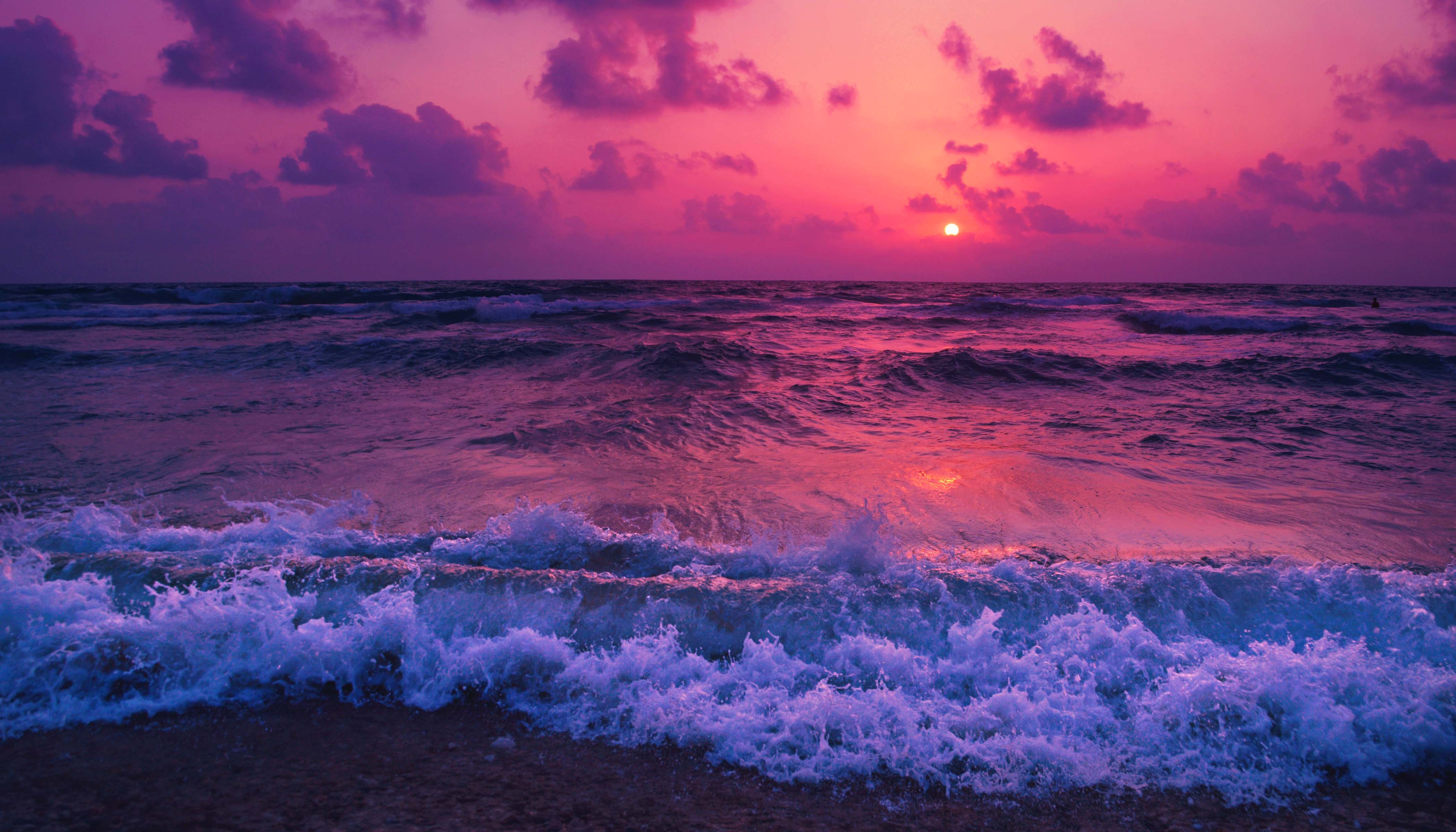 Waves Washing Ashore With A Pink Sunset Waves Washing Ashore With A Pink Sunset